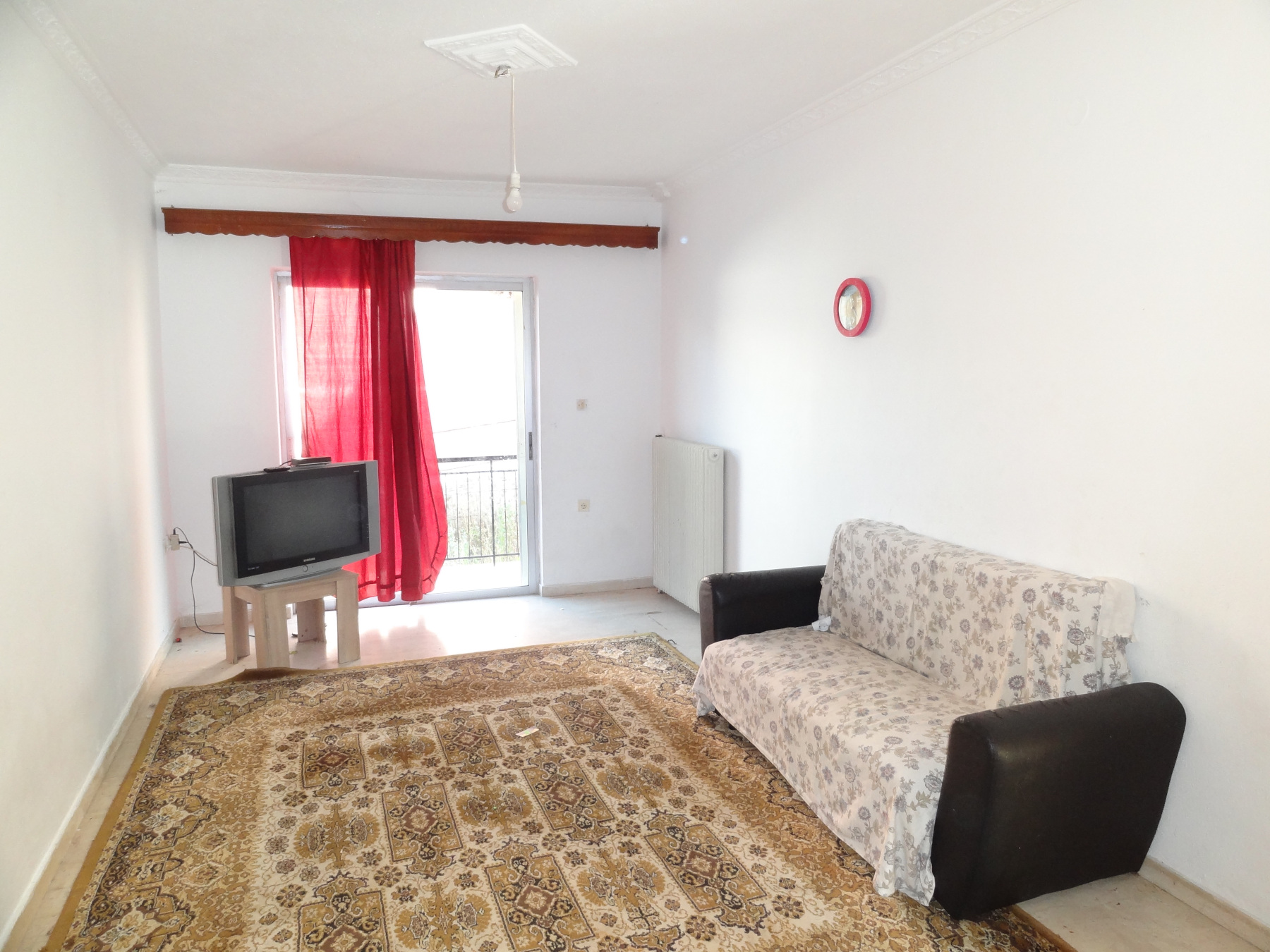 For rent 2 bedrooms ground floor bright apartment of 75 sq.m. near the Hatzikosta hospital in Ampelokipi, Ioannina