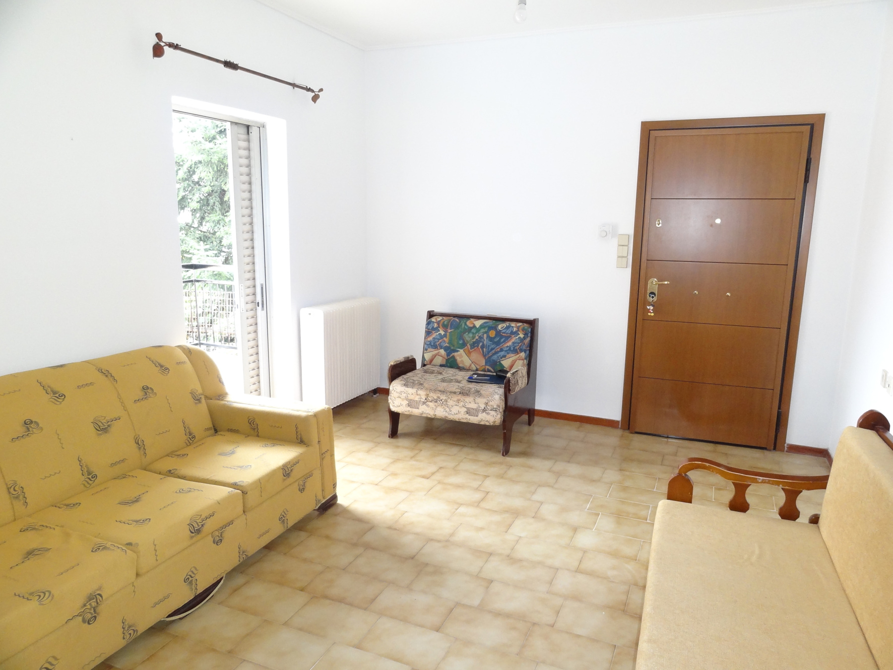 For rent bright 1 bedroom apartment 63 sq.m. 1st floor with parking near Zosimaia school in Ioannina
