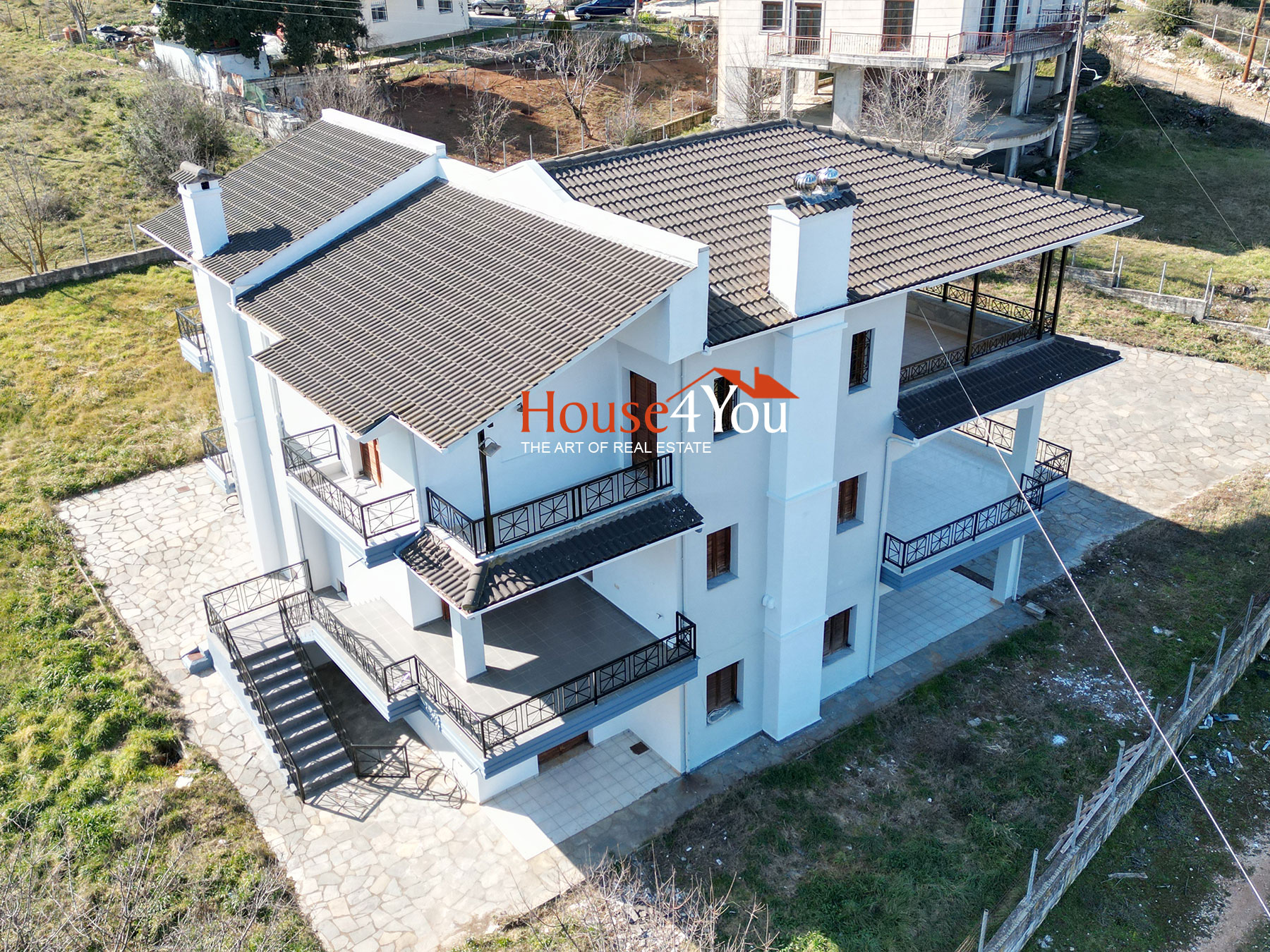 Detached house of 352 sq.m. for sale. on a plot of 1750 sq.m. built in 1999 in Olympiada Ioannina near Peripheriakou